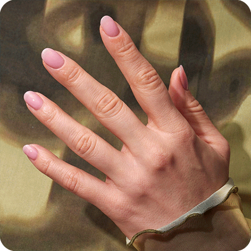 Hand outstretched against a green background with lip gloss manicure on the nails