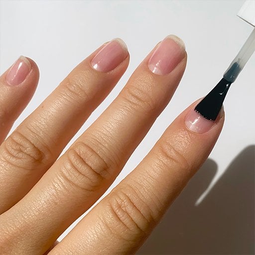 Applying base coat before french manicure - Essie