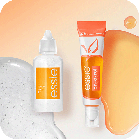 bottle of essie apricot cuticle oil and its roll-on tube version, both near puddles of the oil